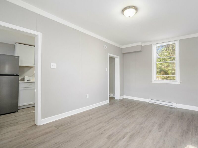 Dining room at 5248 Cordelia Avenue with vinyl plank flooring and partial view of kitchen entry.
