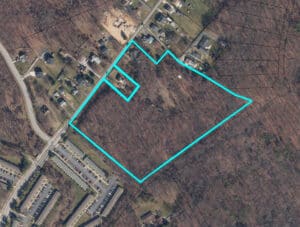 Aerial view of 11.84± acre residential development site in Middle River, MD, outlined in blue.