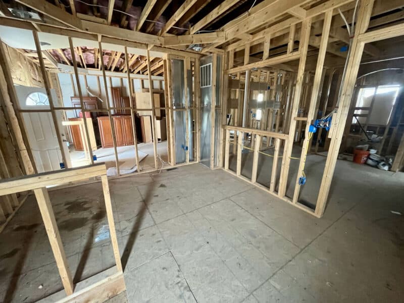 Framed interior unit with open layout and exposed ceiling joists