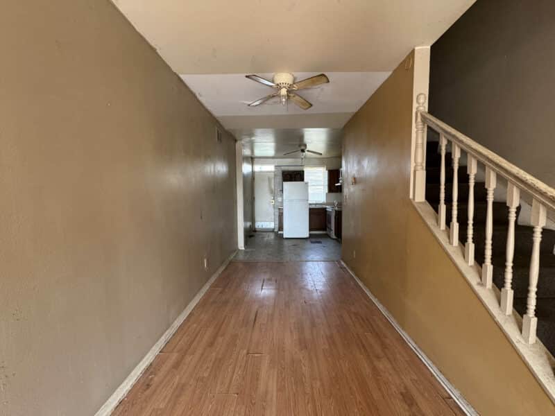 Dining room of 1346 Carroll Street with vinyl plank flooring and open connection to living space.