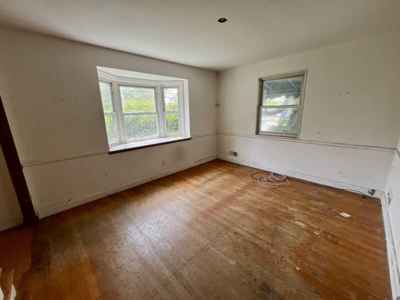 Dining room with large bay window and hardwood flooring at 5501 W. Forest Park Avenue.