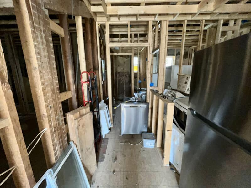 Framed hallway interior with appliances and building materials at 539-549 45th Street