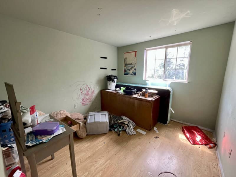 Third bedroom with laminate flooring and large window at 12366 Bonfire Drive in Reisterstown, Maryland.