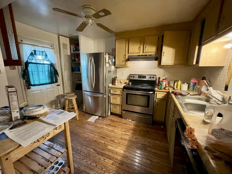 Kitchen at 12366 Bonfire Drive in Reisterstown featuring stainless steel appliances, wood cabinetry, and hardwood flooring.