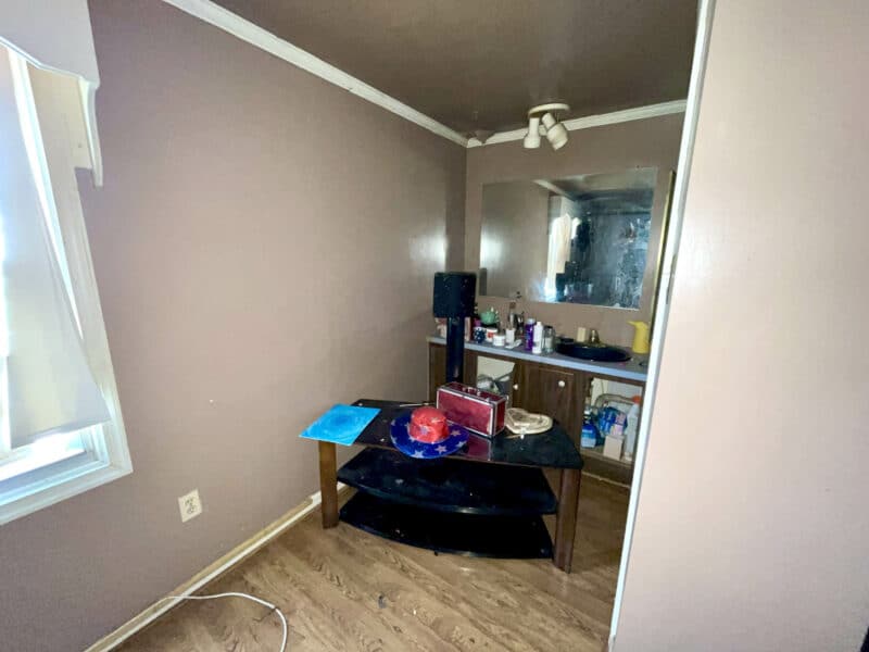 Alternate angle of primary bedroom with laminate floors, ceiling fan, and dresser at 12366 Bonfire Drive in Reisterstown.