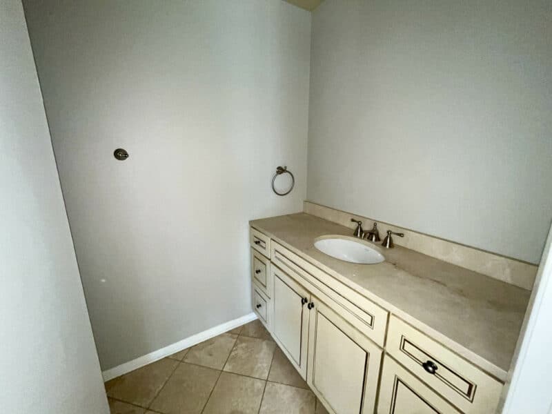 Bathroom with vanity and tiled floor