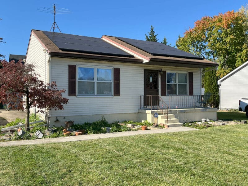 Front exterior view of 334 Royer Road, a single-story rancher with solar panels and a well-kept front lawn in Westminster, Maryland.