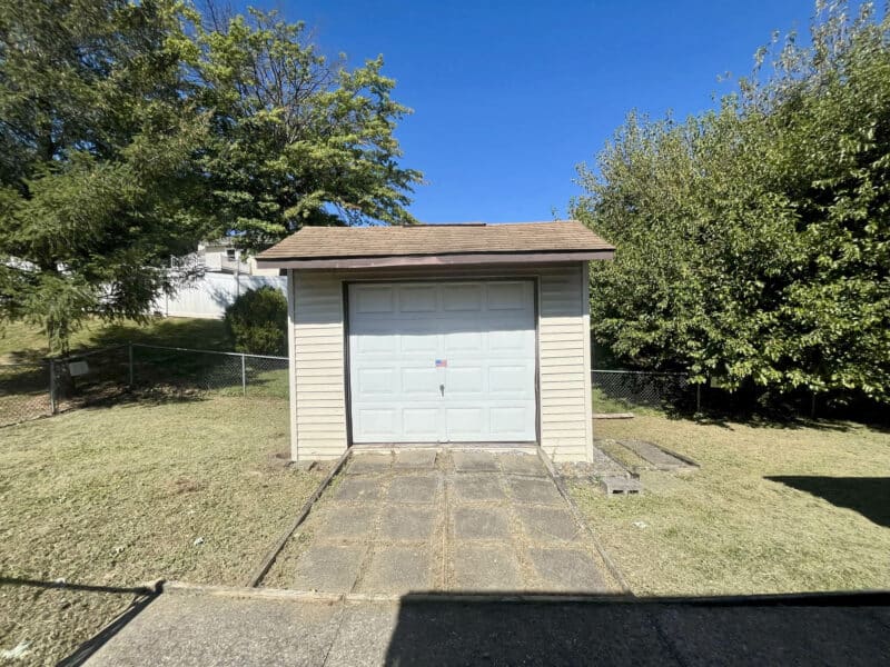 Detached storage shed with driveway at 334 Royer Road, Westminster.