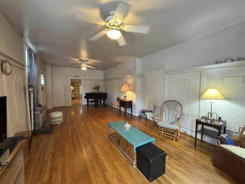 Living room with wood floors and natural light at 1021 Stiles Street.