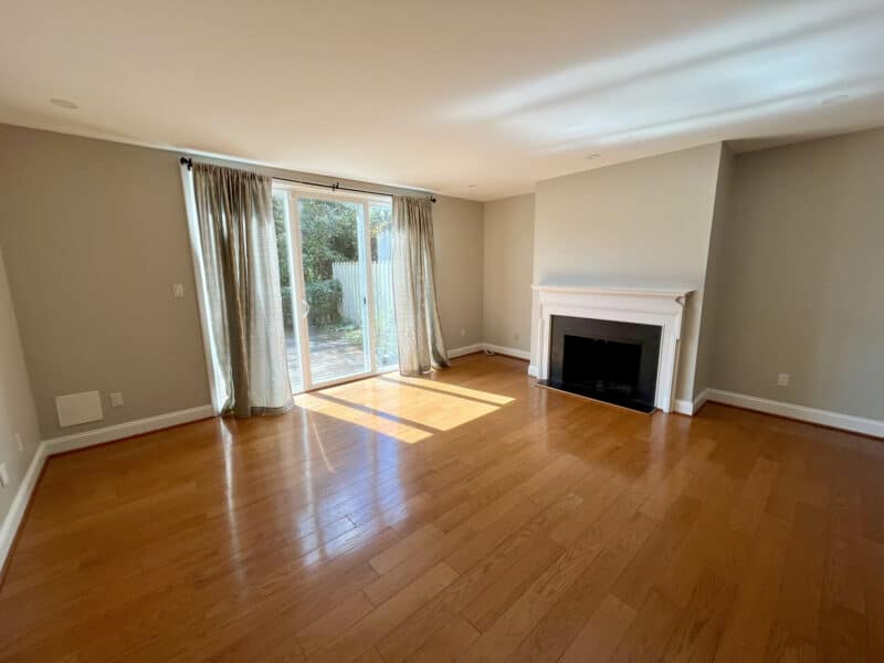 Living room with fireplace and sliding doors