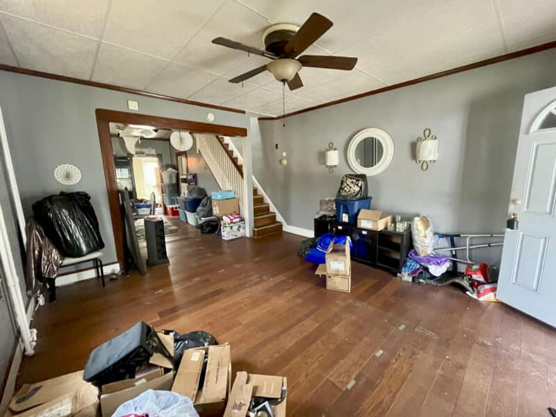 Living room with hardwood floors and ceiling fan at 2701 Baker Street.