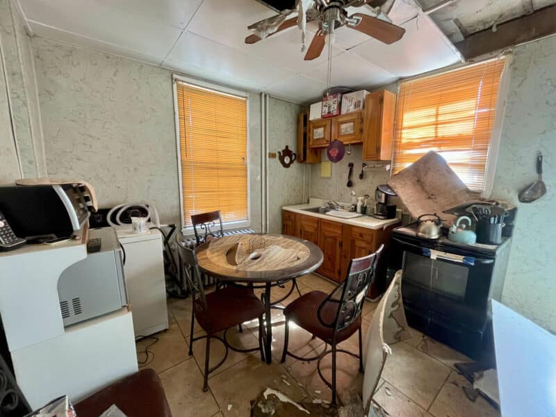 Kitchen with wood cabinets and tile floor at 2701 Baker Street.