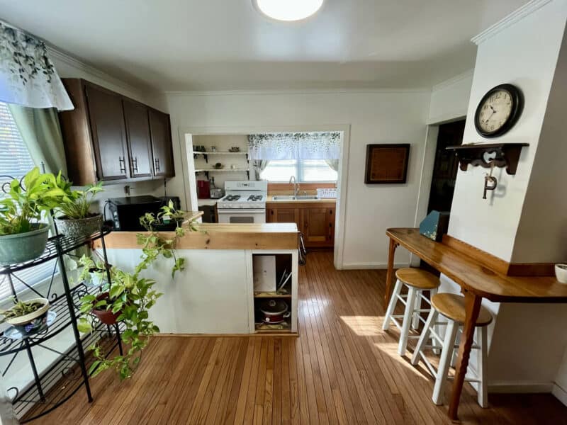 Kitchen at 1207 Joppa Road with wood flooring and ample cabinets.