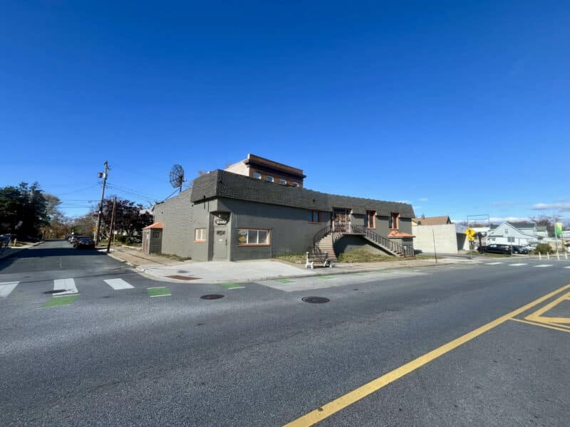 Wide-angle street view of 6826–28 Harford Road showing commercial building and corner exposure at Harford Road and Kildaire Drive.