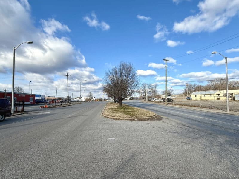 Long roadway view near E. Monument Street commercial corridor in Baltimore City