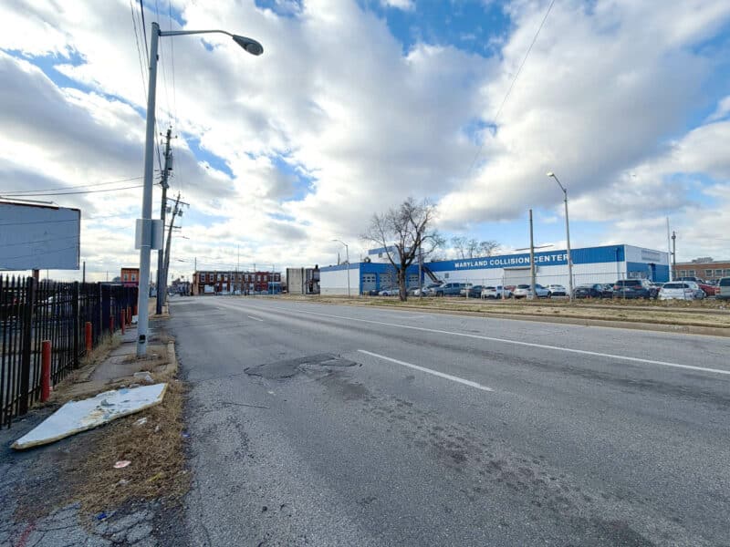 Long roadway view near E. Monument Street commercial corridor in Baltimore City