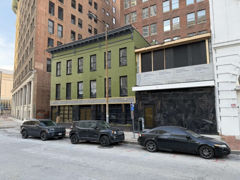 Perspective view of Park Avenue showing 8–14 Park Avenue and nearby downtown landmarks.