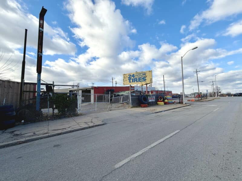 Street view of commercial properties along E. Monument Street in East Baltimore
