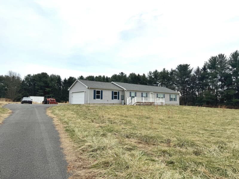 Ranch-style home with asphalt driveway at 38 Groff Farm Lane in Conowingo, Maryland