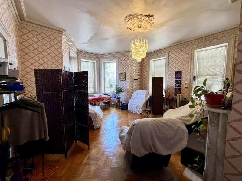 Large interior studio room with bay windows at McCabe Mansion Baltimore