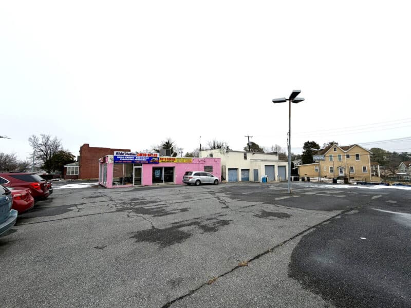 Large paved parking lot and showroom at 5827 Belair Road Baltimore
