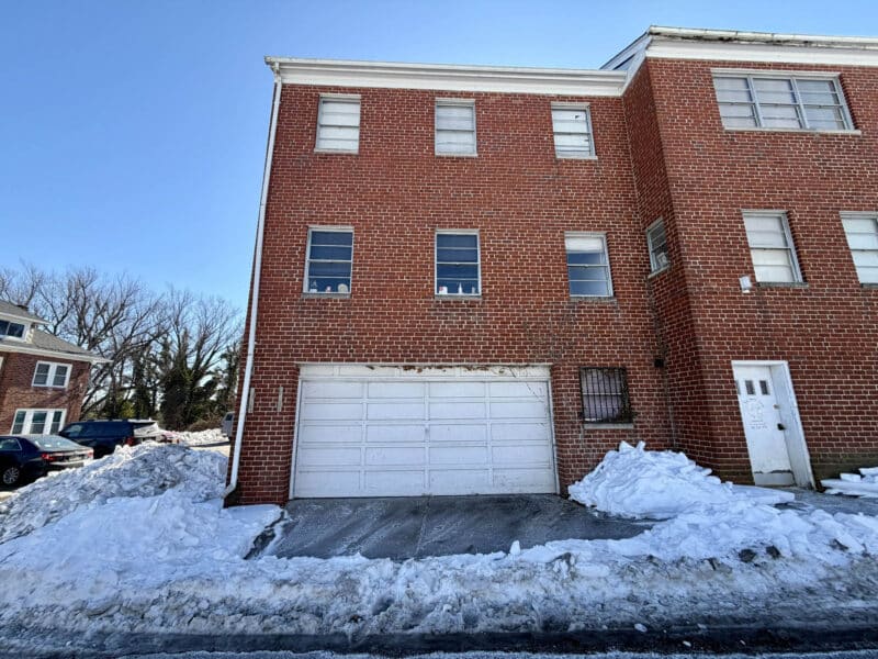 Side garage entrance at rear of McCabe Mansion commercial building