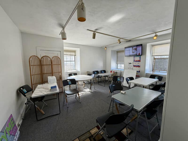 Meeting or classroom space with folding tables and chairs at 5209 York Road
