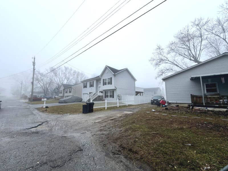 Additional street view angle of Carroll Street in Catonsville Manor, Baltimore County, showing nearby residential homes.