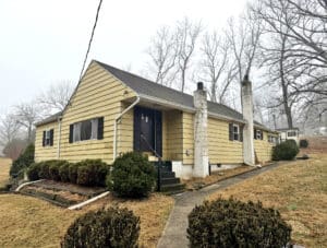 Front exterior of circa 1940 bungalow on 1.845± acres at 2630 Hobbs Road in Glenwood, Howard County Maryland