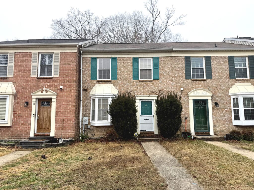 Front exterior of two-story townhome at 12 Island Run Court in Ellicott Mills Catonsville MD