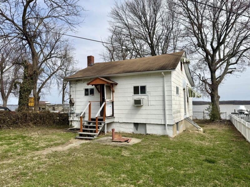 Front exterior of waterfront home at 4327 Shore Road overlooking Back River in Sparrows Point Maryland