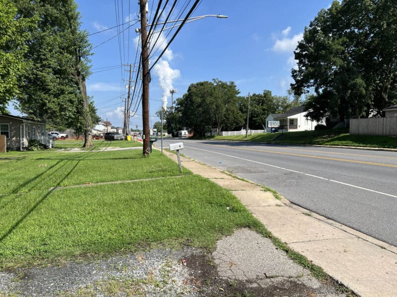 Street view along Fort Smallwood Road showing surrounding residential area and accessibility