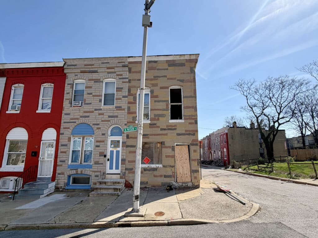 End-of-group brick shell townhome at 2011 North Payson Street in Baltimore