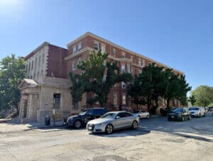 1900 Maryland Avenue apartment building and former bank building at 100 West North Avenue in Baltimore City