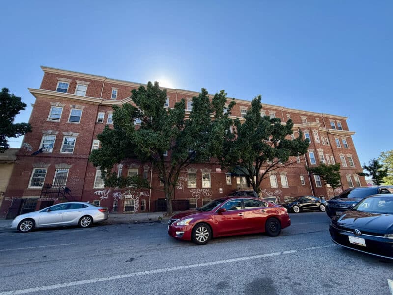 Four-story brick apartment building at 1900 Maryland Avenue in Baltimore City