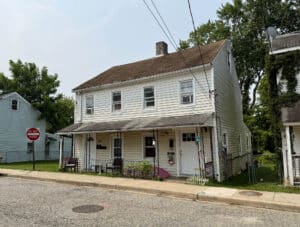 Front exterior of duplex at 119-121 Milburn Street in Elkton, Maryland