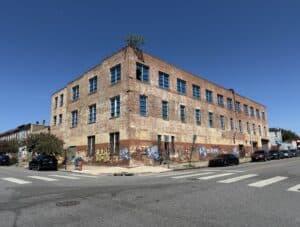 Three-story brick warehouse at 420 S. Mount Street in the Mount Clare area of Baltimore, Maryland.