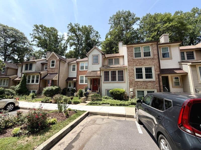 Street view of Swan Point at Lake Elkhorn townhouse community in Columbia, Maryland