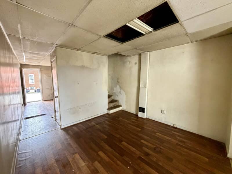 Dining room with staircase in Washington Village/Pigtown Baltimore townhome