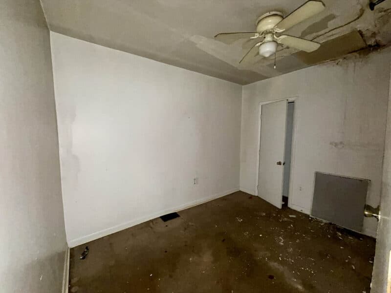 Rear bedroom requiring renovation at 1222 Bayard Street Baltimore City townhome
